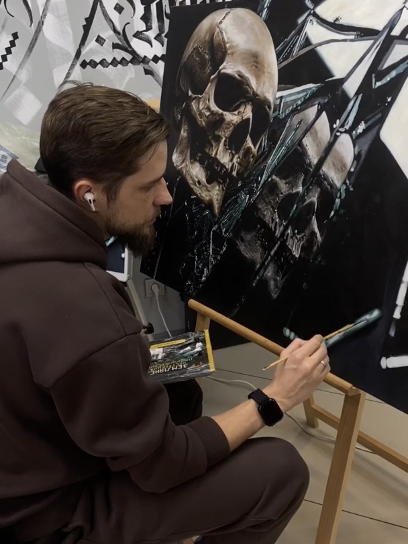 Artist painting a skull
