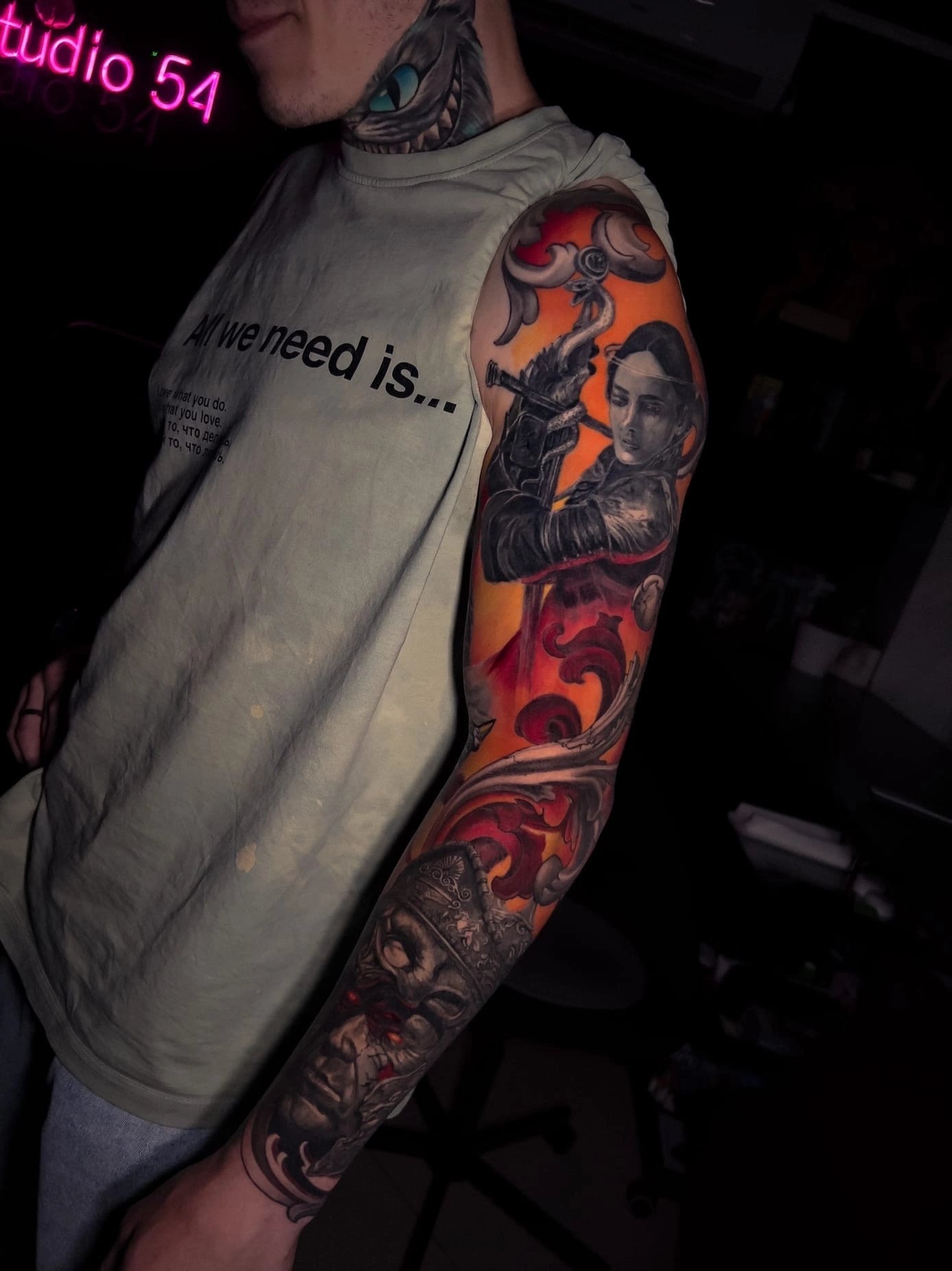 Large-scale colour realism sleeve tattoo by Vladimir Vishar