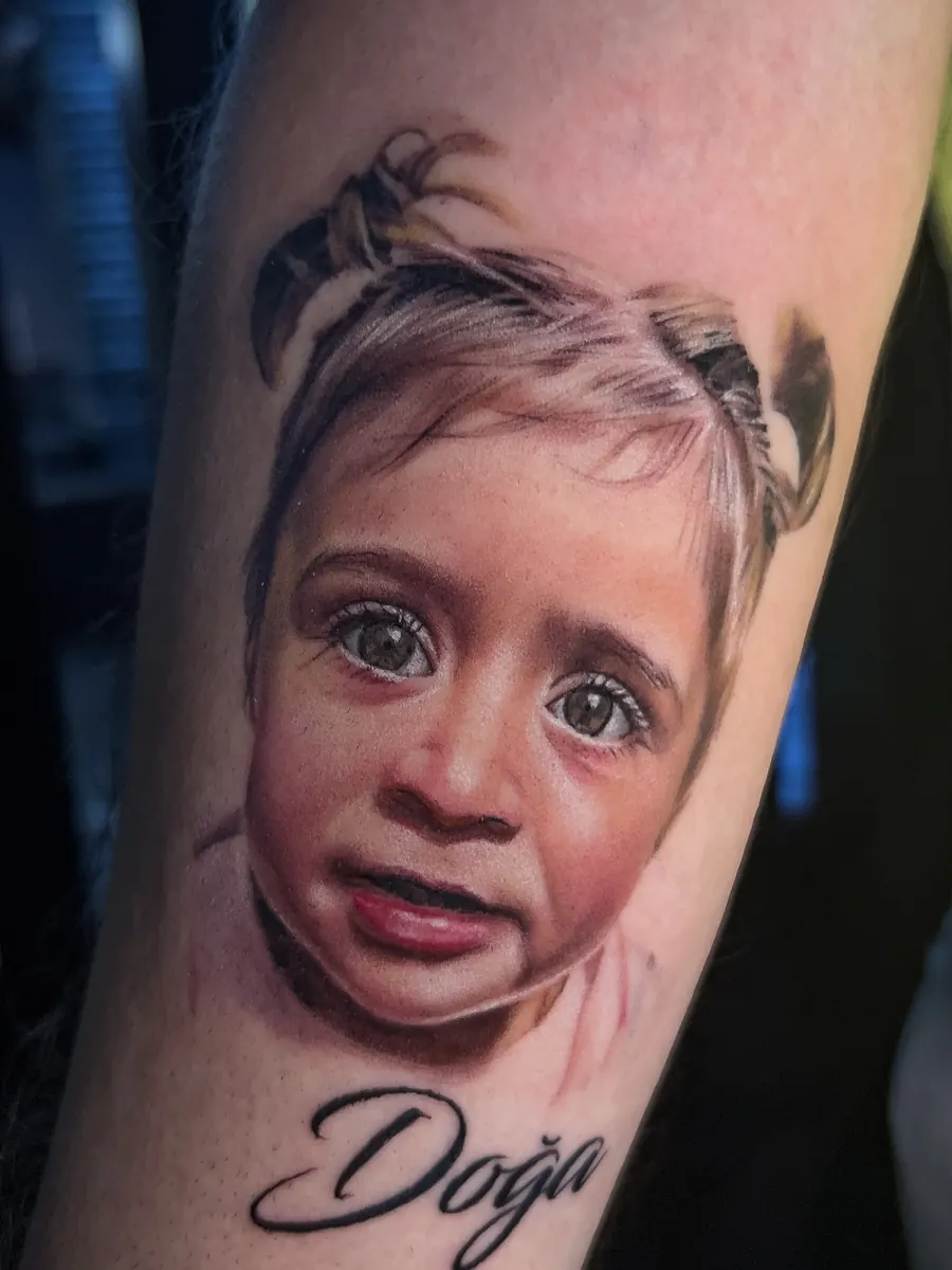 Colour realism child portrait tattoo by Vladimir Vishar