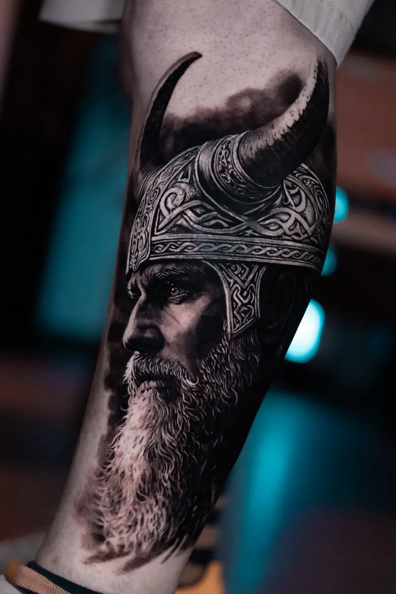 Black and grey bearded warrior portrait tattoo by Vladimir Vishar
