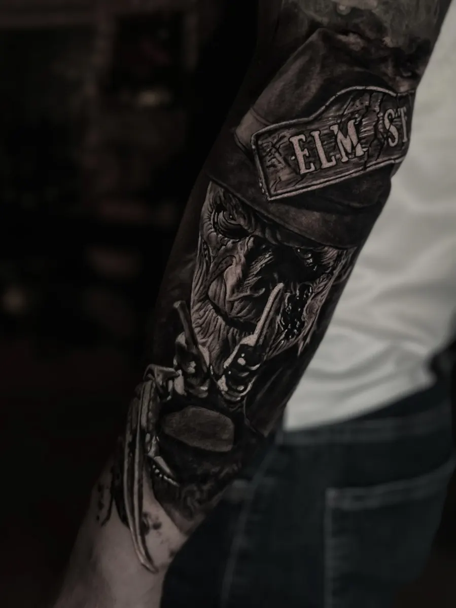 Black and grey musician portrait tattoo by Vladimir Vishar