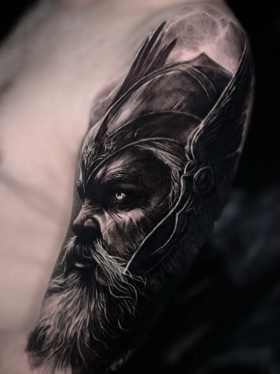 Black and grey warrior portrait tattoo by Vladimir Vishar