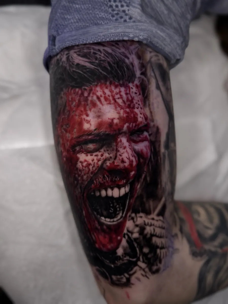 Dark colour realism horror portrait tattoo by Vladimir Vishar